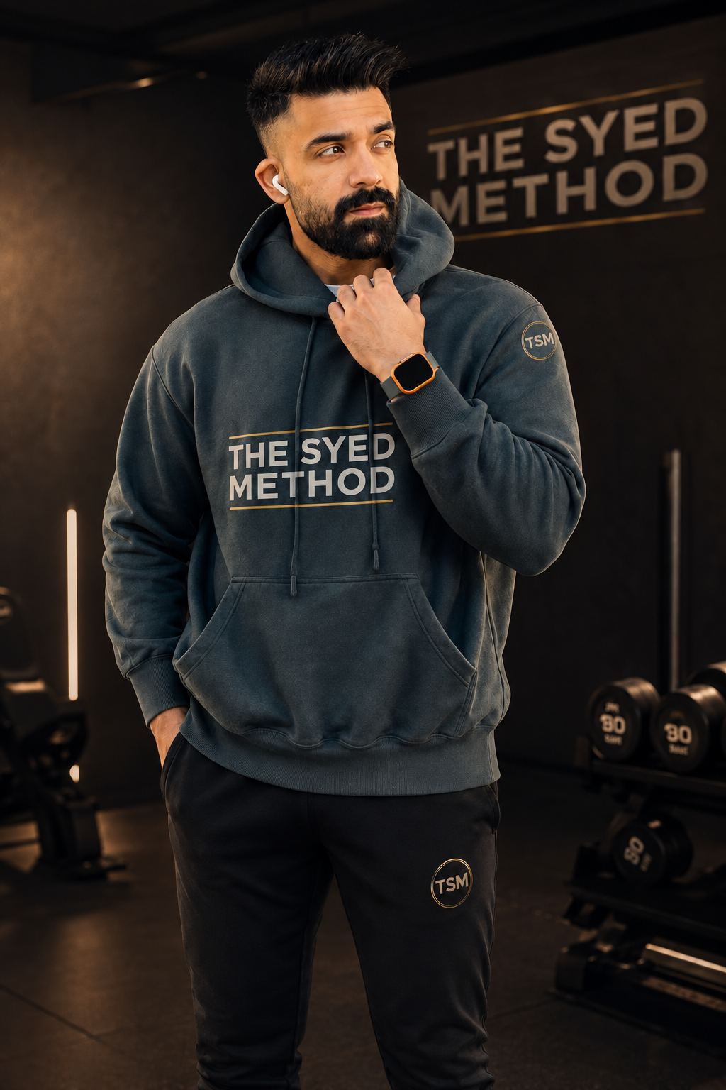 Dark THE SYED METHOD hoodie worn with matching joggers